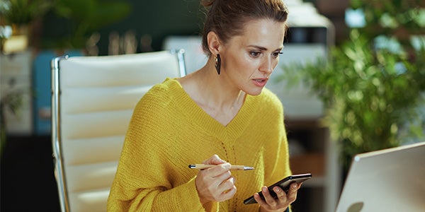 business woman looking at lack of an emergency fund